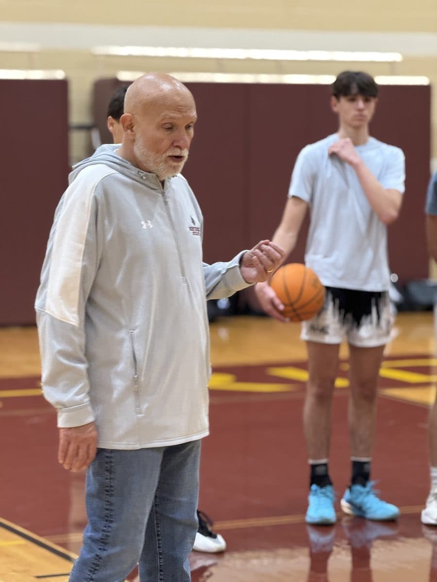Coach Will Rey teaching a player during a skills session at Northridge Prep